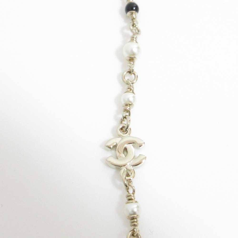 CHANEL Gold Pearl Logo Necklace - Picture 5 of 11
